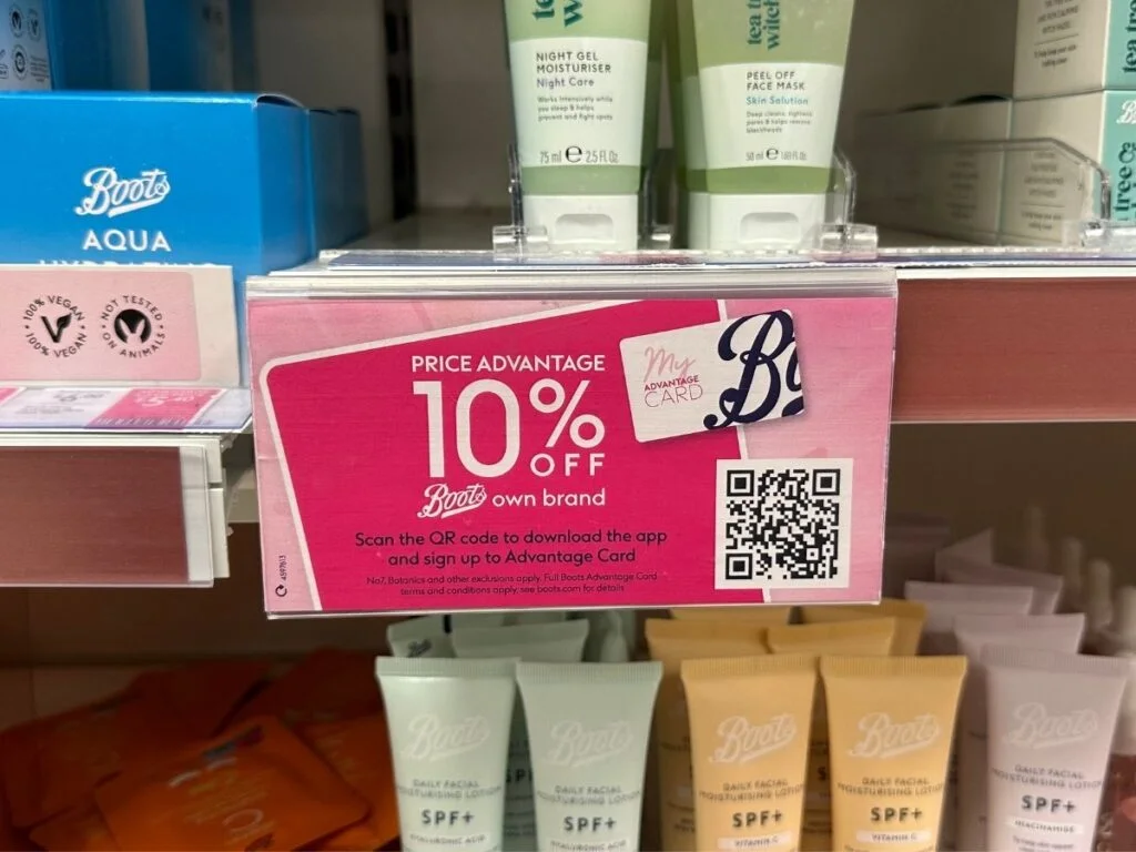 A display in Boots about the price advantage to save money when shopping in store or online