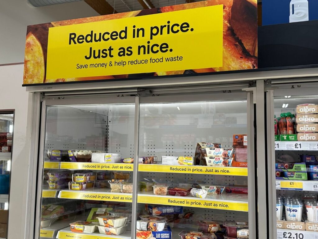 Photo of the reduced section with shelves of food to save money at Tesco