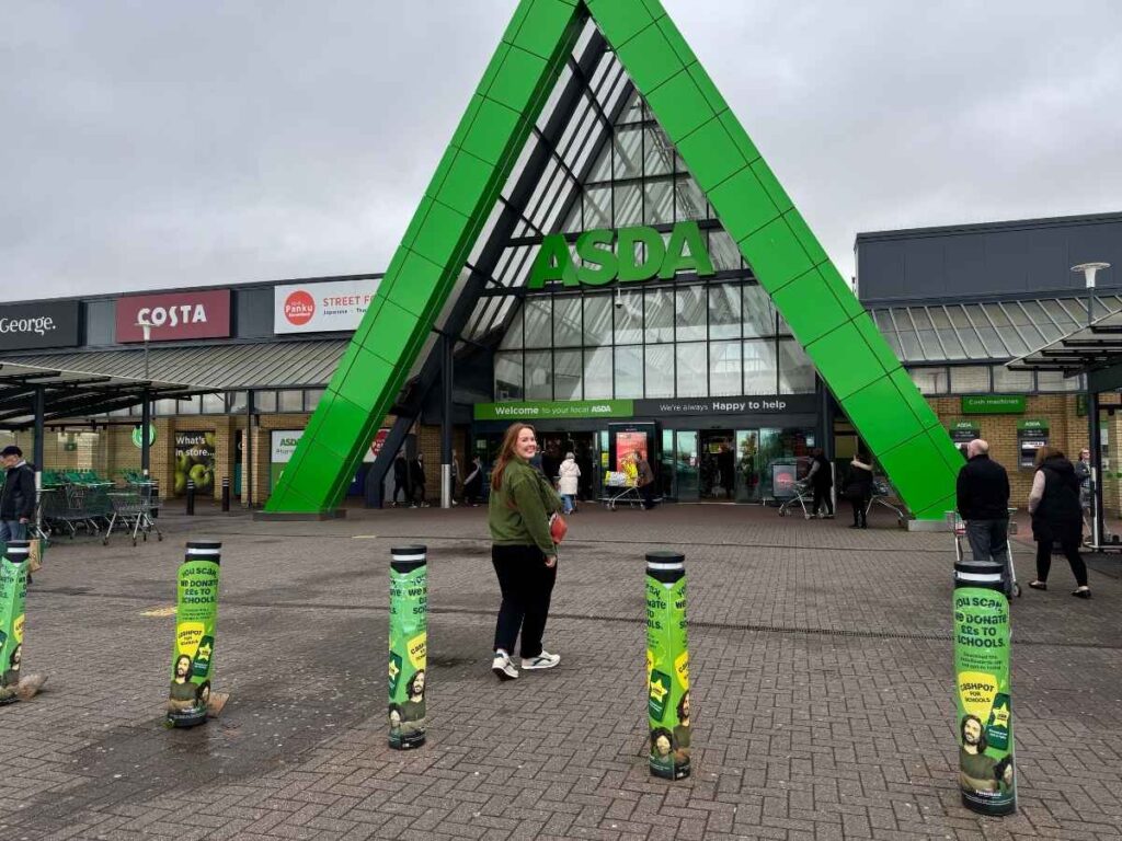 Chloe from Chloe's Deal Club outside of an Asda supermarket