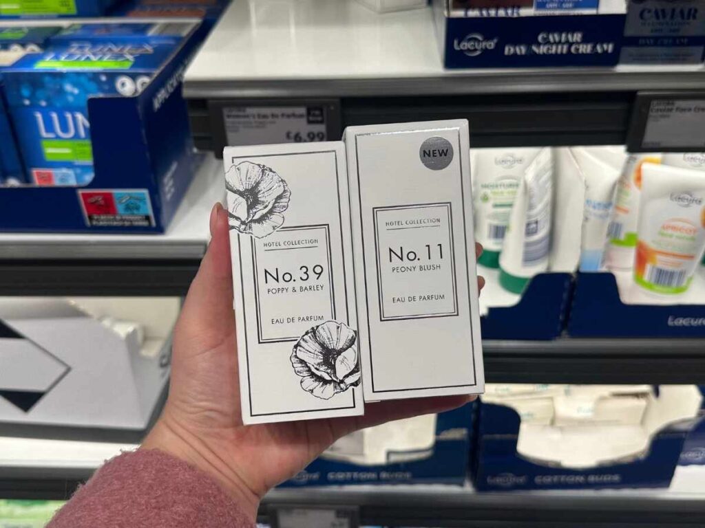 A hand holding Aldi perfume dupes