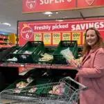 Chloe saving money at Aldi at the Super 6 section