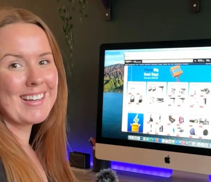 chloe sitting next to computer to show you the best deals at amazon